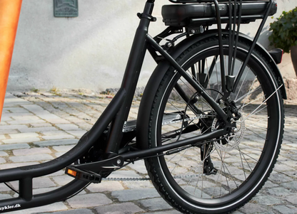 Close up shot of the Amcargobike Ultimate Harmony cargo bike, detailing the back of the bike, specifically rear tyre. 