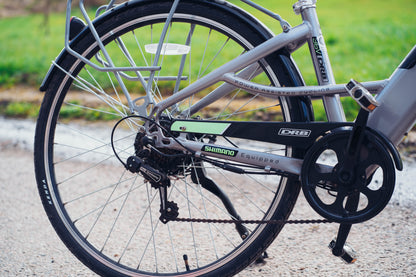 Lifestyle shot of the Dallingridge Harlow model in Silver, detail of the 700c rear trekking tyre.